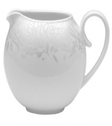 A soft, feminine look with Denby durability, the Lucille Silver creamer offers enduring everyday style. Shimmering swirls adorn creamy bone china in a pattern inspired by vintage lace and designed by English stylemaker, Monsoon.