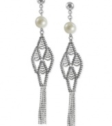 A brush with greatness. The tassels on these drop earrings lend a stylish touch, as do the cultured freshwater pearls (8-8-1/2 mm). Crafted from sterling silver with a rhodium finish.     Approximate drop length: 3-1/5 inches. Approximate drop width: 5/8 inch.