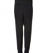 Easy and effortlessly chic, Neil Barretts harem pants are a contemporary cool separate perfect for dressing up and down - Pleated satin waistband, hidden side zip and snap closures, elasticized cuffs - Relaxed fit - Wear with chunky knits, carryall totes and heels
