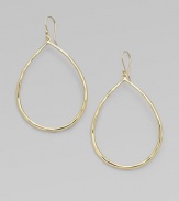 From the Glamazon Collection. Thin faceted hoops of 18k gold make a simple yet sophisticated statement.18k gold Length, about 2½ Ear wire Made in Italy