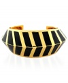 Style is the latest buzzword for Vince Camuto. This chevron-styled cuff bracelet is crafted from gold-tone mixed metal with black enamel for a bold touch. Approximate length: 6 inches.