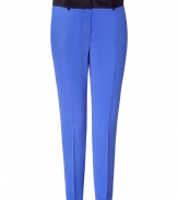 Stylish pants in fine, pure royal blue silk - Soft, ultra-lightweight fabric has an elegant matte sheen - On-trend slim silhouette crops at ankles - Crease detail from hip to hem flatters and elongates the leg - Slash pockets at sides, welt pockets at rear - Contrast decorative banded waist with belt loops - Polished and chic, great for work or play - Pair with an oversize t-shirt and cardigan or billowy blouse