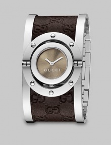 From the Twirl Collection. A modern design featuring a sun-brushed color dial and a stainless steel cuff with brown leather Guccissima inset. Swiss quartz movementWater resistant case to 3 ATMRound stainless steel case, 23mm (0.9)Riveted bezelBrown sun-brushed color dialStainless steel cuff with brown Guccissima leather insetMade in Switzerland 