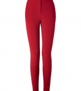 A vibrant hue and a curve-hugging cut lend these ruby red Schumacher skinny trousers their stylish, statement-making appeal - Especially flattering, thanks to a touch of stretch - On-trend, higher-rise, ultra slim cut - Slim tab waist and zip fly - Slash pockets at sides, welt pockets at rear - Decorative seams at rear elongate the leg - Chic, ankle-zip embellishment - Pair with a blazer, button down and ballet flats by day, or dress up with a silk blouse, leather jacket and platform pumps at night
