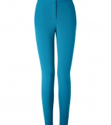 A vibrant hue and a curve-hugging cut lend these turquoise Schumacher skinny trousers their stylish, statement-making appeal - Especially flattering, thanks to a touch of stretch - On-trend, higher-rise, ultra slim cut - Slim tab waist and zip fly - Slash pockets at sides, welt pockets at rear - Decorative seams at rear elongate the leg - Chic, ankle-zip embellishment - Pair with a blazer, button down and ballet flats by day, or dress up with a silk blouse, leather jacket and platform pumps at night