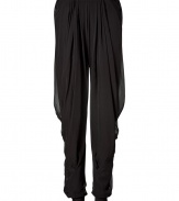 Ultra-chic black draped pants with jersey cuff from Donna Karan - Edgy-yet-ethereal, these draped harem pants bring on-trend style to any outfit - Harem silhouette with draped details, elastic waist and cuffs, ruching at leg - Wear with a bustier tank, leather jacket, and platform heels