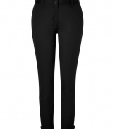 Stylish pant in fine, black cotton stretch blend - A chic classic from eco-friendly label Edun - Waxed fabric has a slight sheen - Slim cut, crops at ankle - Medium rise, with belt loops and button closure - Two flattering rear pockets - Sleek cutout embellishment at cuffs - Polished and versatile, ideal for both work and play - Pair with a silk blouse or a t-shirt and blazer and pumps or ballet flats
