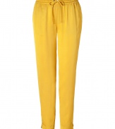 Stylish pants in fine, pure viscose - Sumptuously soft, lightweight material in a vibrant, on-trend shade of yellow - Slim yet relaxed, low rise cut - Gathered drawstring waist - Slash pockets at sides, welt pockets at rear - Fashionable 7/8 length crops at ankles - Casually elegant, easily dressed up or down - Pair with a fitted t-shirt and leather sandals, or try a silk tank, blazer and wedges