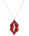 Sealed with a kiss. RACHEL Rachel Roy's long pendant necklace takes a playful, girly approach to glamour. Embellished with sparkling red glass accents, it's crafted in gold tone mixed metal. Approximate length: 45 inches. Approximate drop: 2-1/2 inches.