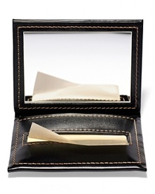 Powder-free tissues absorb excess oil and perspiration from skin. Blotting Papers are encased in a refillable black faux-leather case with mirror. Contains 100 sheets per pack. Powder-free tissues absorb excess oil and perspiration from skin. Blotting Papers are encased in a refillable black faux-leather case with mirror. Contains 100 sheets per pack.