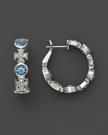 Faceted Swiss blue topaz and white sapphire Maltese crosses, set in sterling silver, are an elegant take on the classic hoop. By Elizabeth Showers. Faceted Swiss blue topaz and white sapphire Maltese crosses, set in sterling silver, are an elegant take on the classic hoop. By Elizabeth Showers.