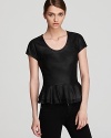 A ladylike peplum meets edgy leather on this Cut25 top with a knit back for a cool-girl spin on these haute runway trends.