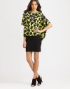 EXCLUSIVELY AT SAKS. A playful way to achieve that relaxed, contemporary aesthetic, this floral-print silk top has dropped shoulders and an asymmetrical hem. BoatneckDropped shouldersShort dolman sleevesAsymmetrical cropped front hemSilkDry cleanImportedModel shown is 5'9 (176cm) wearing US size X-Small/Small.