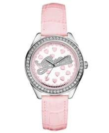 A playful timepiece from GUESS with feminine crystal accents and pink hearts. A playful timepiece from GUESS with feminine crystal accents and pink hearts.