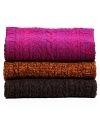 Add a little sunshine to those cold winter days with a vibrantly colored cable knit scarf from MARC BY MARC JACOBS.