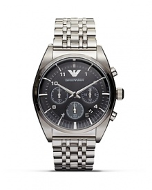 Designed for performance and style, this stainless steel watch from Emporio Armani is an exemplary choice. Features like its silver applied indexes and textured dial ensure commanding cool. Designed for performance and style, this stainless steel watch from Emporio Armani is an exemplary choice. Features like its silver applied indexes and textured dial ensure commanding cool.