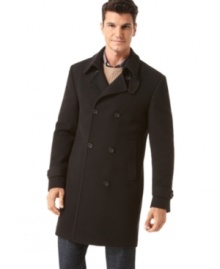 For style that never fails, this double-breasted topcoat from DKNY is an instant classic. For style that never fails, this double-breasted topcoat from DKNY is an instant classic.