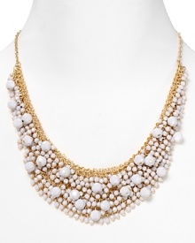Brighten up every outfit with this layered beaded bib necklace from Cara accented by a dramatic collar of white stones.