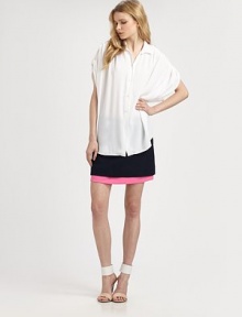 The colorblocked mini in a kicky A-line silhouette.Mid-rise waistSide slash pocketsSide zipperAbout 16 longCottonDry cleanImported Model shown is 5'10 (178cm) wearing US size 4.OUR FIT MODEL RECOMMENDS ordering true size. The colorblocked mini in a kicky A-line silhouette.Mid-rise waistSide slash pocketsSide zipperAbout 16 longCottonDry cleanImported Model shown is 5'10 (178cm) wearing US size 4.OUR FIT MODEL RECOMMENDS ordering true size.