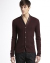 Cashmere ribbed-knit cardigan with leather tab detail on the side.V-neckFull button-downCashmereDry cleanMade in Italy