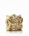 A 14K gold scalloped design featuring pink sapphire accents adds radiance to your PANDORA bracelet.