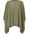 Worn in lieu of a classic cardigan or pullover, Ralph Laurens green cashmere poncho makes an elegant, of the moment statement - Easy, relaxed cut, with a flattering boatneck and openings at either arm - Draped silhouette features an asymmetric hem - Layer over a blouse, button down or long sleeve t-shirt and pair with skinny denim or cigarette pants