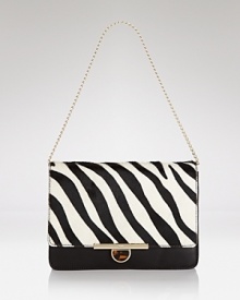 This perennially polished DKNY clutch gets wild in spot-splashed calf hair with luxe leather trim. Let this beauty be the basis of your next fashion moment. This perennially polished DKNY clutch gets wild in spot-splashed calf hair with luxe leather trim. Let this beauty be the basis of your next fashion moment.