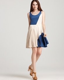 Master lady-like chic in this DKNY dress that flaunts a playful flared skit. Go ahead, give it a twirl. Master lady-like chic in this DKNY dress that flaunts a playful flared skit. Go ahead, give it a twirl.