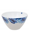 Out of the blue. A vibrant floral motif blossoms on this striking serving bowl, ensuring your table is anything but garden variety. (Clearance)