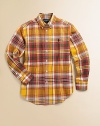 The epitome of preppy style, a classic long-sleeved button-down shirt is crafted in light-as-air cotton with a heritage madras print for a handsome finish.Button-down collarLong sleeves with barrel cuffsButton frontBack yokeShirttail hemCottonHand washImported Please note: Number of buttons may vary depending on size ordered. 