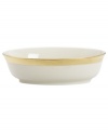 A classic hand crafted collection from Lenox, this Westchester serving bowl brings distinctive beauty to the table, featuring sturdy bone china and exquisitely etched gold borders for a lustrous glow.  Qualifies for Rebate