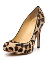 Leopard-printed haircalf takes the classic platform pump for a walk on the wild side. By IVANKA TRUMP.