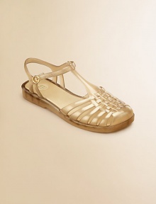 A strap and buckle closure lends an updated look to your not-so-basic jellies.T-strap and buckle closurePVC upperPVC liningPVC solePadded insoleImported A strap and buckle closure lends an updated look to your not-so-basic jellies.T-strap and buckle closurePVC upperPVC liningPVC solePadded insoleImported
