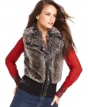 A hot layering piece, add the look of luxe to your cold-weather outfit with this GUESS faux-fur vest!