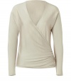 Luxe basics anchor any modern wardrobe, and Ralph Laurens beige wrap pullover proves an elegant indispensable - Sumptuously soft cashmere and silk knit blend - Slim cut tapers gently through waist - Long sleeves and deep v-neck - Elegant gather detail at hip - Versatile and polished, seamlessly goes from work to weekend - Pair with everything from pencil skirts and suit trousers to skinny denim and leather pants