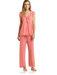 THE LOOKV-neckTiered flutter sleeves with lace trimRuffled neckline with lace trimElastic drawstring waistTHE FITTop: about 25 from shoulder to hemPants: rise, about 8; inseam, about 25THE MATERIALPolyester/rayonCARE & ORIGINMachine washImportedModel shown is 5'9 (175cm) wearing US size Small. THE LOOKV-neckTiered flutter sleeves with lace trimRuffled neckline with lace trimElastic drawstring waistTHE FITTop: about 25 from shoulder to hemPants: rise, about 8; inseam, about 25THE MATERIALPolyester/rayonCARE & ORIGINMachine washImportedModel shown is 5'9 (175cm) wearing US size Small.