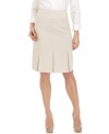 Jones New York takes the stress out of suiting with this easy care petite skirt: It's a crisp, pleated look that's machine washable!