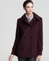 This Calvin Klein pea coat, fashioned with a detachable hood, puts a refined spin on the timeless style. Stitching lends unique detail and uitra-soft texture is a welcome addition.