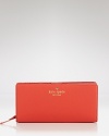 In simple black leather, kate spade new york's bifold wallet organizes the day-to-day essentials with polished flair.