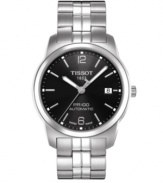 Sleek with self-winding fuctionality, Tissot's PR 100 watch is a modern marvel. Crafted of stainless steel bracelet and round case. Black dial features silver tone numerals at twelve and six o'clock, applied stick indices, minute track, date window at three o'clock, luminous three hands and logo. Swiss automatic movement. Water resistant to 100 meters. Two-year limited warranty.