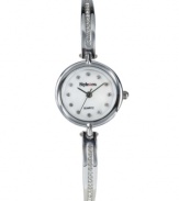 A lovely bangle bracelet lined with crystals. This Style&co watch features a silvertone alloy bracelet with crystal accents and a round alloy case. Mother of pearl dial with crystals at indices and logo. Quartz movement. Two-year limited warranty.