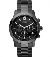 A contemporary chronograph watch that goes bold in black, by GUESS.