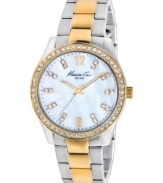 Change your tone this season with this steel watch gone gold, by Kenneth Cole New York.