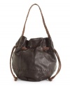 From subtle styling to the braided drawstring, The Sak's Indio leather purse compliments your look with earthy simplicity.