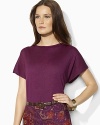 Rendered in sumptuous tussah silk, a boatneck top is finished with short dolman sleeves for a modern look.