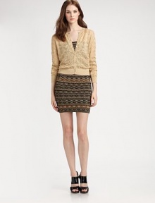 A shimmering knit with a cropped silhouette offering a perfectly buttoned-up look.Round neckLong sleevesButton closureRibbed trimAbout 20 from shoulder to hemViscose/polyester/nylonDry cleanMade in Italy of imported fabric Model shown is 5'10 (177cm) wearing US size 4. A shimmering knit with a cropped silhouette offering a perfectly buttoned-up look.Round neckLong sleevesButton closureRibbed trimAbout 20 from shoulder to hemViscose/polyester/nylonDry cleanMade in Italy of imported fabric Model shown is 5'10 (177cm) wearing US size 4.