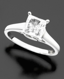 The epitome of supreme elegance: a sparkling princess-cut solitaire diamond (1-1/2 ct. t.w.) engagement ring set in platinum. The epitome of supreme elegance: a sparkling princess-cut solitaire diamond (1-1/2 ct. t.w.) engagement ring set in platinum.