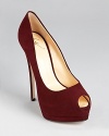 In rich, bordeaux suede, these Giuseppe Zanotti pumps look oh-so-luxe with a little black dress.