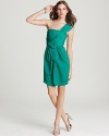 Imbued with a gorgeous jewel-tone shade, this BCBGMAXAZRIA one-shoulder dress is party perfect.