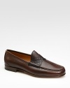 Elegant leather moccasins are finished with micro-guccissima leather trim. Leather sole Made in Italy 